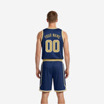 Side view of the navy and gold reversible basketball uniform showing gold side panel stripe on jersey and shorts