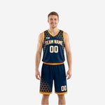 Navy and gold reversible basketball uniforms with honeycomb hex pattern on navy side, gold V-neck trim, and matching shorts, front view