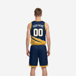 Side view of the navy and gold reversible basketball uniform showing V-neck armhole binding and shorts silhouette