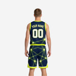 Side view of navy and gold reversible basketball uniform showing bound armhole and side panel star-burst pattern on navy base