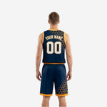 Side view of navy and gold reversible basketball uniform showing armhole binding and side panel construction on navy side