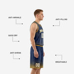 Full set view of navy and gold sublimated basketball uniform jersey and matching shorts laid out showing complete design front and back