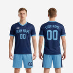 Full back view of custom blue soccer uniform set showing back number and player name on navy sublimated jersey