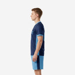 Custom blue soccer uniform right side view showing navy side stripe on light blue shorts and sleeve cuff trim detail