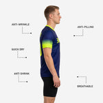 Navy soccer training jersey sleeve detail showing neon yellow to navy blue gradient sublimation