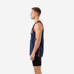 Side view of navy and orange custom basketball jersey showing full-length orange side stripe and sleeveless athletic cut