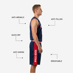 Close-up detail of navy basketball shorts with red side panel showing sublimated vertical team name and striped waistband