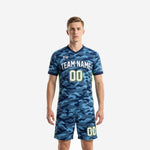 Front view of mens custom blue soccer uniform in navy and sky blue camo print with team name and number 00
