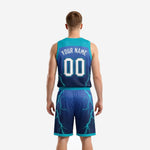 Second side view of teal basketball uniforms showing full lightning graphic coverage on shorts and sleeveless jersey armhole binding detail
