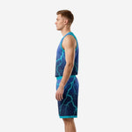Side view of navy and teal sublimated basketball uniform set showing lightning pattern wrapping jersey and shorts with teal hem band