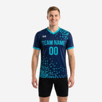 Navy and teal pixel-burst custom soccer training jersey front view on adult male model