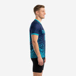 Custom navy soccer training jersey with teal geometric print left side view on male model