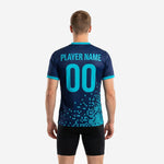 Full-dye sublimated navy and teal soccer training jersey chest detail showing team name and number print zones