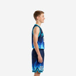 Front view of navy youth basketball uniforms featuring rising blue flame graphic, arched team name, and white front number 00 on deep navy jersey