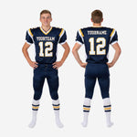 Back view of navy youth football uniform showing back number placement and matching navy pants with gold pant stripe in youth sizes