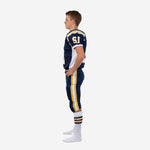 Opposite side view of navy and gold youth American football uniform set showing pant stripe detail and jersey shoulder panel banding