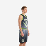 Custom charcoal and neon green basketball uniform front view showing arched team name front number and comet graphic on a male model