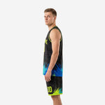 Left side view of neon green and black sublimated basketball uniform showing armhole binding and shorts hem band detail