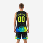 Right side view of black neon green basketball jersey and shorts with geometric tribal pattern and paint-splash lower panel
