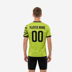 Back view of neon green custom printed practice jersey with player surname and number placement