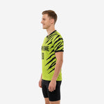 Right side view of neon green and black custom printed practice jersey showing diagonal tiger claw graphic coverage