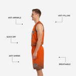 Orange and black reversible basketball uniform back view with player name arc and back number above halftone hem