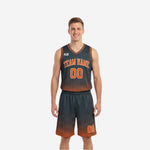 Custom orange and black reversible basketball uniform front view with halftone dot pattern and arched team name on chest