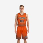 Orange and black reversible basketball uniforms showing orange halftone front side and charcoal reverse side full set view
