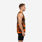 Front view of custom orange and yellow basketball jersey showing camo pattern, V-neck orange binding, and white team name lettering across the chest