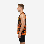Side view of orange and yellow basketball jersey showing sleeveless athletic cut, straight hem with side vents, and continuous camo pattern
