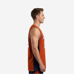 Front view of sublimated orange basketball jersey with white-outlined V-neck and navy contrast side panels
