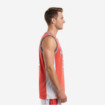 Front view of custom orange basketball jersey with white side panel, navy-striped crew neck, arced team name and number 23 on orange sublimated mesh