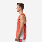 Side profile of sublimated orange basketball jersey showing white side panel construction and flat armhole binding detail