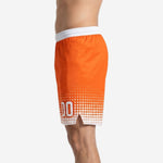 Second side view of orange and white sublimated basketball shorts with bold player number at lower leg panel