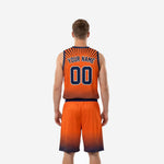 Right-side view of orange sublimated basketball uniform showing navy waistband and shorts leg number placement