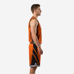 Left side view of orange and black sublimated basketball uniform showing diagonal panel construction