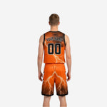 Side view of orange and black reversible basketball uniform showing V-neck collar and black armhole binding detail