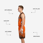 Back view of orange and black reversible basketball uniform showing back name and number print zones on matching shorts