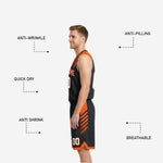 Back view of custom orange and black reversible basketball uniform with player name and number placement on jersey