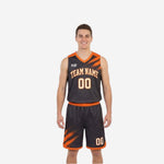 Orange and black reversible basketball uniforms showing charcoal side and orange side of the full 2-piece set front and back