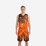 Orange and black reversible basketball uniforms front view showing orange lightning bolt design with black trim and custom team name and number
