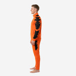 Left side profile of custom orange soccer tracksuit showing stand collar jacket and slim-fit tapered training pants