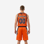Opposite side view of orange and navy custom basketball uniform set with distressed texture and wide navy waistband on the shorts