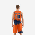 Opposite side view of custom orange and navy sublimated basketball uniform set with drawcord waistband and hem side split