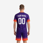 Close gradient detail on custom soccer uniform kits for teams showing Royal Purple fading into Neon Orange at sleeve cuffs and hem
