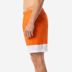 Waistband detail on orange and white custom mens soccer shorts with elastic and drawcord construction