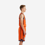Orange youth basketball uniform set front view showing arced team name across chest, front number 00, and navy armhole binding on youth model