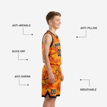 Back view of orange and black youth travel basketball uniforms showing player name and number placement on jersey