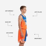 Back view of royal blue and orange custom youth basketball uniform showing back number placement and diagonal color-block design on shorts