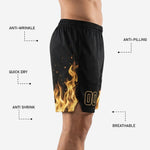 Back view of black custom basketball shorts with gold flame graphic visible on left leg and back number or name placement zone